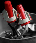 Close-up of Twister Pro Wire Connectors Jar Of 500 Smooth Twist On Nuts For 22 To 8 AWG with SureGrip in use.