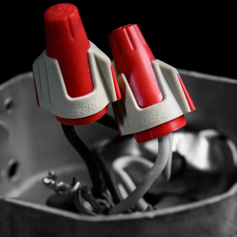 Close-up of Twister Pro Wire Connectors Jar Of 500 Smooth Twist On Nuts For 22 To 8 AWG with SureGrip in use.