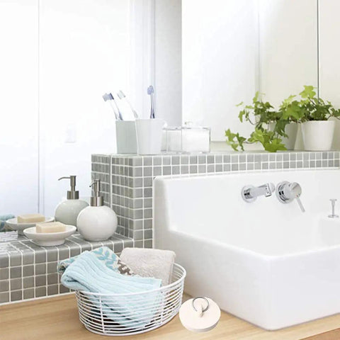 Bathroom with white tub, grey tiles, and Four Piece Bath Tub And Sink Drain Stoppers Set With Hanging Ring Flexible Rubber Plugs nearby.