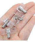 Hand holding clear plastic cabinet shelf pins for removable glass panels and wood shelves heavy duty and easy to install