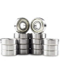 Slick Pro-Grade ABEC-9 608 Skate Bearings Pre-Lubricated Heavy-Duty Dual-Ball Shield Design for inline skates, stacked in rows.