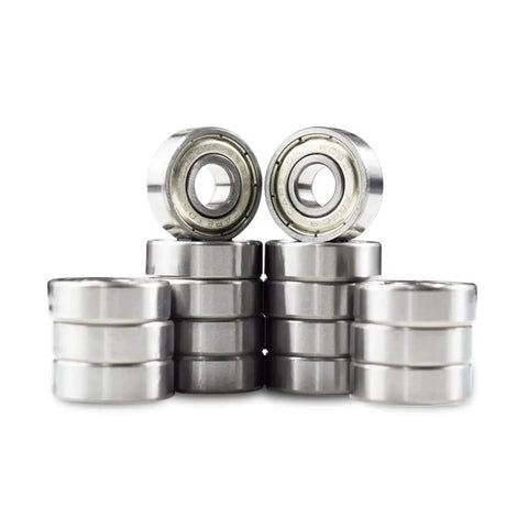 Slick Pro-Grade ABEC-9 608 Skate Bearings Pre-Lubricated Heavy-Duty Dual-Ball Shield Design for inline skates, stacked in rows.