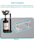 Silicone Resin Cleanup Mat And Transfer Surface For 3D Printers 550mm By 375mm gray, featuring a funnel and bottle on the mat.