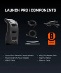 Launch Pro I Circle B Edition Launch Monitor components with cables, alignment stick, and club marker pack for indoor practice.