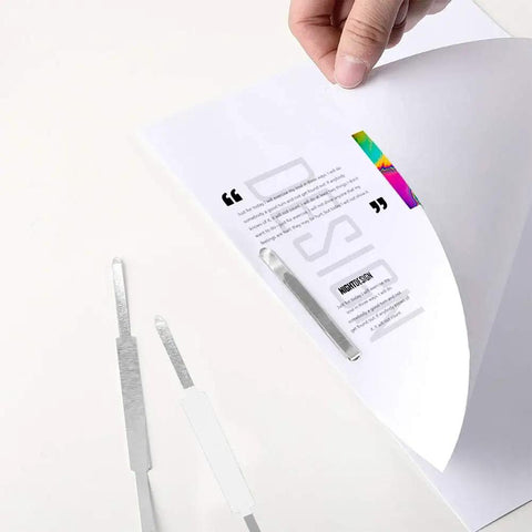 Heavy Duty Self Adhesive Ring Binders With Solid Steel Fasteners holding paper in a folder, showcasing peel stick design for organization.