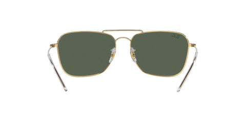 Front view of RBR0102S Caravan Reverse Sunglasses with gold frame and dark green lenses, showing concave lens design.