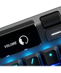Top Shelf Mechanical Gaming Keyboard Featuring Heavy Duty Aluminum Chassis And Smart Display For Live Game Stats Discord Chats And Spotify Tracks, close-up of volume control and OLED display.