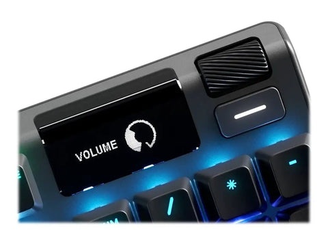 Top Shelf Mechanical Gaming Keyboard Featuring Heavy Duty Aluminum Chassis And Smart Display For Live Game Stats Discord Chats And Spotify Tracks, close-up of volume control and OLED display.