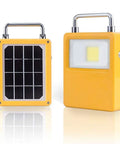 Workhorse 20W Led Portable Work Light And Solar Flood Illuminator with yellow housing and solar panel facing front, compact design.