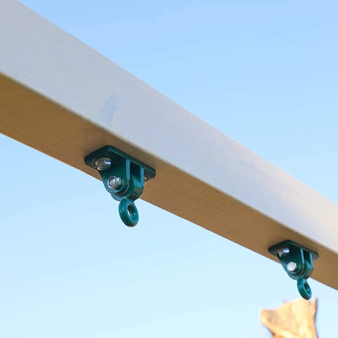 Close-up of Beefy 10000 Lb Heavy Duty Swing Hanger Set For Indoor Outdoor Swing Sets Pack Of Four Green Weatherproof Iron Hangers mounted