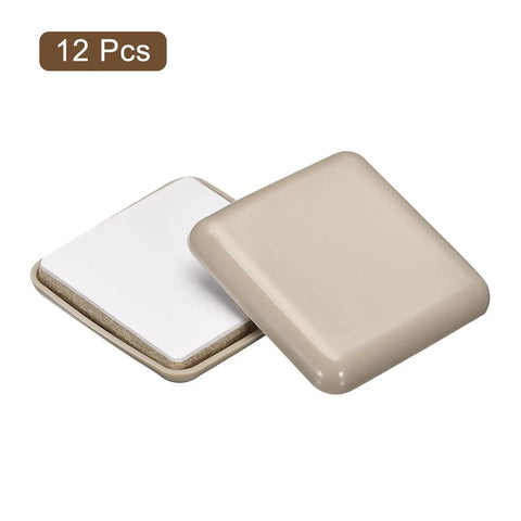 Slick Heavy Duty Furniture Sliders For A No Sweat Move With These Self Adhesive Square Chair Glides, 50mm grey plastic pads.