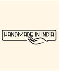 Illustration of a hand beneath the text 'Handmade in India' on a beige background.