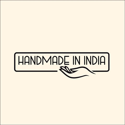 Illustration of a hand beneath the text 'Handmade in India' on a beige background.