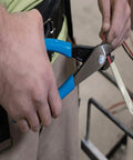Person using Workhorse 3-Piece Tool Set with lineman's side-cutting pliers, demonstrating cutting power on wire, made in USA.