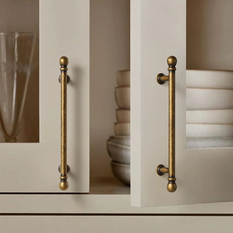 Antique Brass Cabinet Pulls Set Of 10 5 Inch Hole Center on white cupboard doors in kitchen