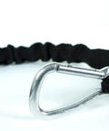 Close-up of metal carabiner on shock absorbing bungee tug line for skijoring and bikejoring, hands free dog leash with waist belt compatibility