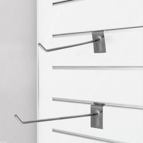 Slatwall Hooks For Phone Accessories, Heavy Duty 50 Pack Iron Pegboard Display Hangers mounted on white wall