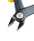Micro Cutter Flush Cutter angled blackened jaws in focus, precision wire cutting tool for electronics with durable carbon steel jaws