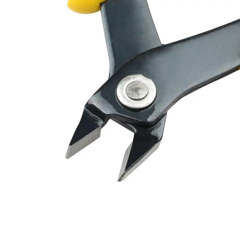 Micro Cutter Flush Cutter angled blackened jaws in focus, precision wire cutting tool for electronics with durable carbon steel jaws