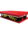 Heavy Duty Electric Hydraulic Scissor Lift Table With Beefy Steel Build And Massive 13200 Lb Capacity For The Garage Or Warehouse Easy Foot Pedal Lift angled view with safety markings.
