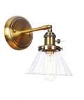 Straight Up Stunning Nordic Metal Wall Sconce With Adjustable Hand Blown Glass Shade And No Fuss Switch E27 One Light Wall Lamp for Bedroom or Dining Room Setting with gold finish and transparent shade.