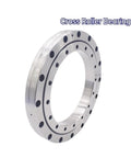 XSU080258 Cross Roller Bearing For CNC Turntable 220X295X25.4Mm showing a sleek design with multiple holes for smooth rotation.