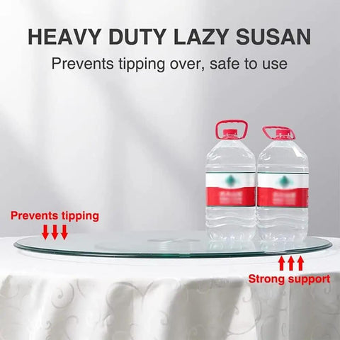 Bombproof Tempered Glass Lazy Susan Turntable with thickened serving plate on table, demonstrating stability with water bottles.