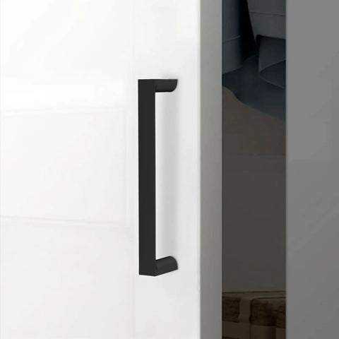 10 Pack 5 Inch Matte Black Kitchen Cabinet Pulls With 128mm Center To Center, 5.5 Inch Length And 1 Inch Projection, mounted on door