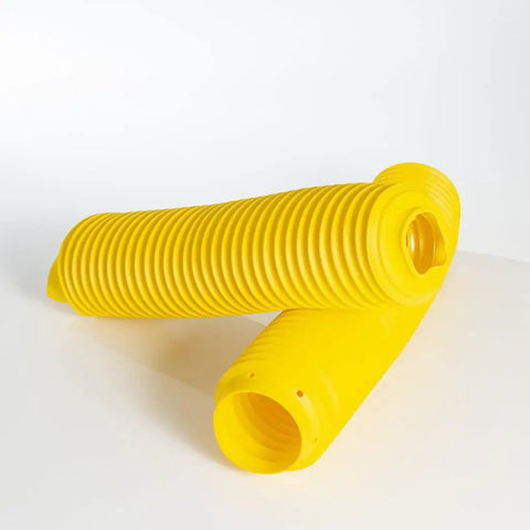 Hella Heavy Duty Yellow Fork Bellows Rubber Suspension Boot against a white background, designed to shield your rig from dust and gunk.