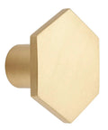 Close-up of a gold hexagon cabinet knob, solid brass with brushed finish, 10 Pack 1.3 Inch Gold Cabinet Knobs Solid Brass Hexagon Drawer Pulls Brushed Brass Hardware for Kitchen Cabinets Drawers and Furniture Modern Update Stylish Upgrade For Any Decor.