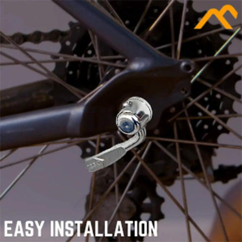 Replacement Quick Release Rear Skewer For Road And Mountain Bike Trainers attached to bike frame, showcasing installation.