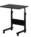 Rock Solid Adjustable Height Rolling Computer Desk With Smooth As Butter Locking Casters Portable Standing Laptop Table For Tight Quarters And Remote Work Setup In Glossy Black with four casters.