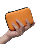 Beefed Up Snake Bite Kit With Venom Extractor Suction Pump For Humans And Pets in portable orange case held in a hand