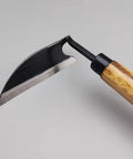 Effortless Weeding Sickle Garden Tool With Curved Handle Hand Forged High Carbon Steel Scythe For Grass Cutting And Weed Removal Durable Garden Sickle Built For Longevity close-up