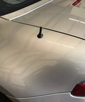 Super Shorty 1.5 Inch Antenna For Saturn Sky Black Powder Coated Billet Aluminum Plug N Play Includes 0.75 Inch Delete Cap Easy Install Sleek Shorty Look That Upgrades Your Ride Style Every Day installed on car trunk