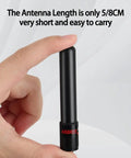 Close-up of hand holding a short stubby antenna from the Dual Band VHF UHF Ham Radio Antenna SMA Female Short Stubby 1.96 Inch and 3.14 Inch Two Pack for Baofeng UV 5R Mini BF F8HP Pro K5PLUS UV 21R DM32 Outdoor Camping Hiking Radio Accessories