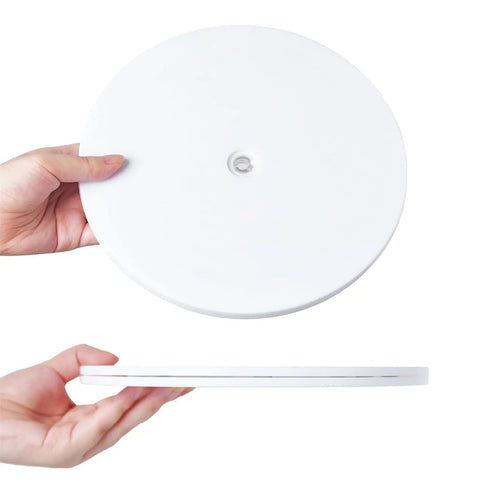 Hands holding Must Have 4 Inch Acrylic Lazy Susan Turntable With Ball Bearing For Spice Rack Kitchen Pantry Table Decor White