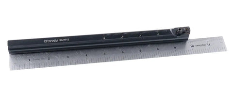 Heavy Duty 3/4 Inch Boring Bar With 10 Inch Overall Length For CNC And Manual Lathes resting on ruler