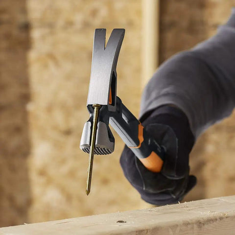 Person using IsoCore 22 Oz Milled-Face Framing Claw Hammer With Shock Reduction Dual-Layer Grip And Vibration Control for nailing