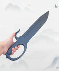 Hand holding 18 Inch Plastic Butterfly Sword from Set Of 2 For Martial Arts Training Black Practice Blades Lightweight Durable Safe Swords
