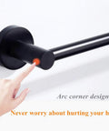 Slick Black Bathroom Hardware Set Wall Mounted 24 Inch Towel Bar with finger showing safety corner design
