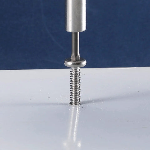 Premium Heavy Duty Size 12 X 2 Inch Flat Head Tek Screws 100 Pack 410 Stainless Steel in use with Allen drive on white surface.