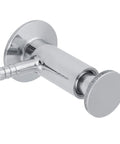 Side view of a 2-inch stainless steel tri-clamp sampling valve with hose barb inlet and knurled cap