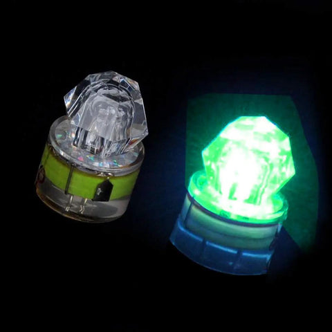 Two glowing green 10 Pack Deep Drop LED Fishing Lights With Automatic Flashing Underwater Attractant, Waterproof Diamond Lure Light.