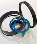 Premium Aftermarket Hydraulic Cylinder Seal Kit For Cat 189-5386 Heavy Machinery Repair Spare Parts Fits Excavators Bulldozers Durable Seals Ensure Tight Fit Keeps Equipment Running Smooth On The Job Any Day Without Fault Guaranteed. black and blue hydraulic seals arranged on white background