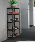 5-Tier Boltless Storage Shelf Built Different With Rock Solid Iron Frame for Garage and Workshop Heavy Duty Adjustable Racks Scratch Resistant Powder Coat Finish Black with tools and plants displayed.