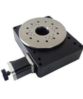 Slick High Precision Motorized Rotary Positioning Stage Delivering Buttery 360 Degree Rotation With Tight Worm Gear Mechanics And A Solid 100 Millimeter Indexing Base For Dead Center Performance, showing top view with mounting holes.