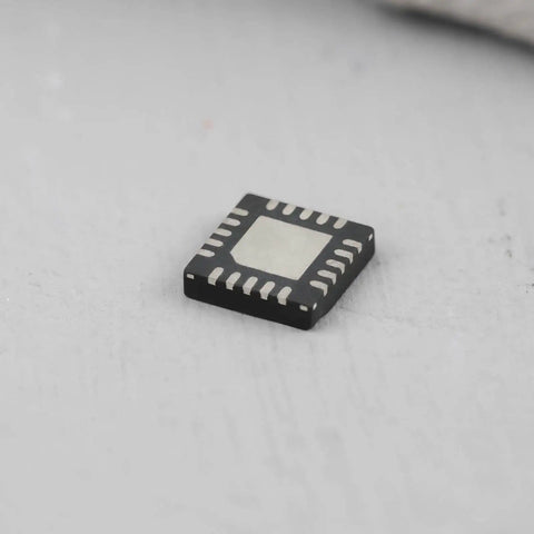 Two Pack 20 Pin Power IC Chips TPS51285ARUKR TPS51285A for electronic projects on a light surface, angled view.
