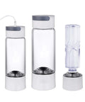 Hydrogen Rich Water Generator Bottle With Glass Cup Body SPE PEM Dual Chamber Ionizer H2 Inhalation Device shown from front.