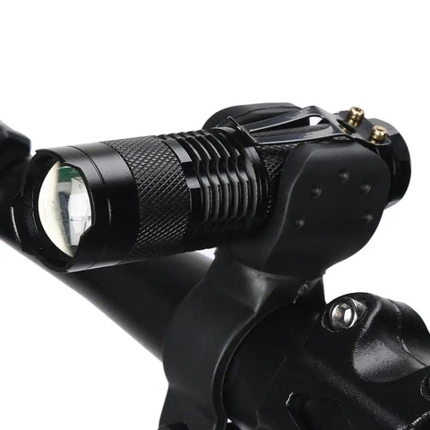 Super Bright Waterproof Bike Front Light With Adjustable Handlebar Clip For Road And Mountain Night Riding In High Low And Flash Modes Durable Aluminum Alloy Body With Rainproof Construction For All Weather